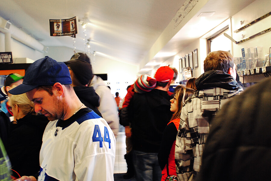 A large crowd inside the CloutsnChara store for the Steve Dangle book signing event in April 2019.